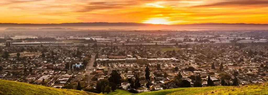 Aerial view of Hayward CA in the central East Bay — hair transplant clinic nearby at Blackhawk Hair Restoration Danville