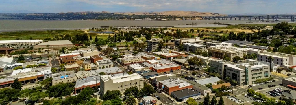 Aerial view of Martinez CA and the Carquinez Strait waterfront — hair transplant clinic nearby at Blackhawk Hair Restoration Danville